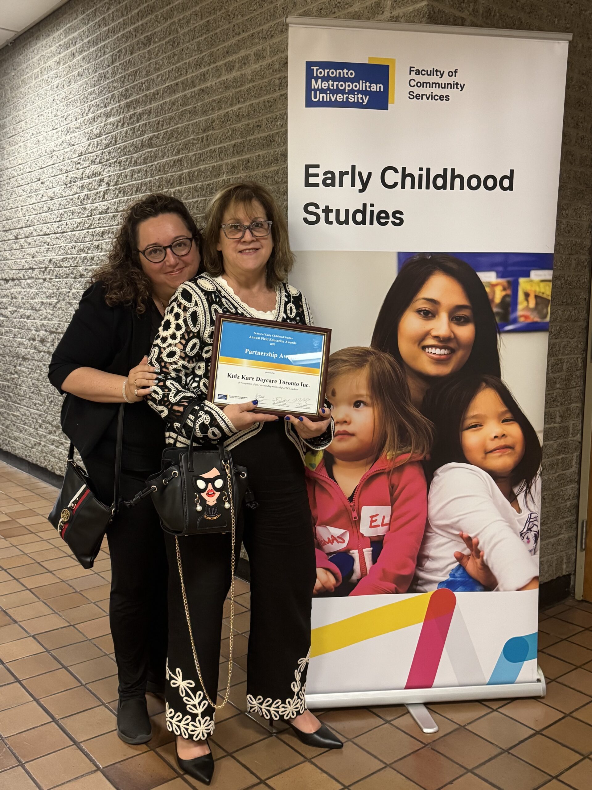 Ms Jennifer and Ms Karyn with TMU Mentorship award